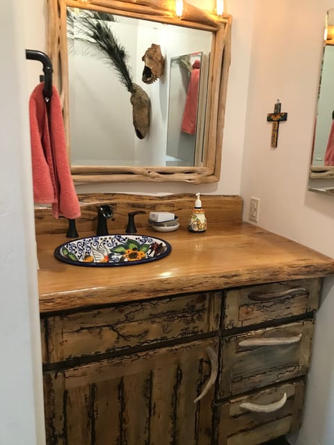 Main bathroom, Mexican toilet and sink, handmade cabinets, large walk in shower