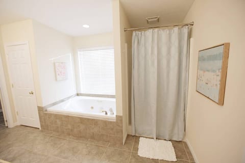 Combined shower/tub, hair dryer, towels, soap