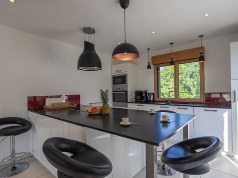 Property, Furniture, Table, Sink, Cabinetry, Kitchen, Interior Design, Lighting, Countertop, Wood