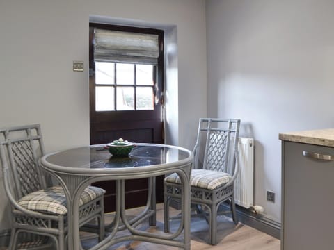 Charming dining area | The Milking Parlour - Stone House Farm Holiday Cottages, St Bees, near Whitehaven
