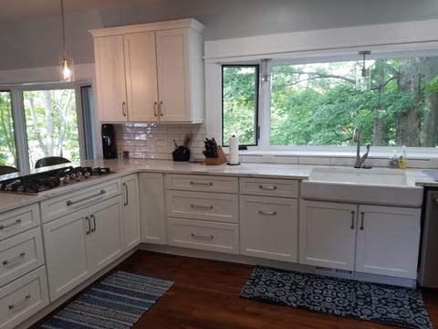 Kitchen with view of lake and back deck