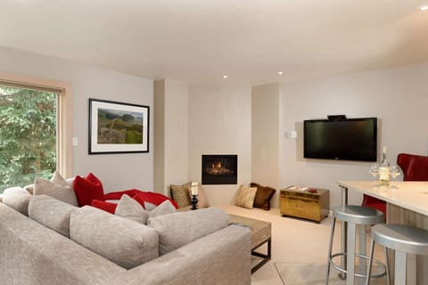 Your group will enjoy evenings relaxing in the living area with gas fireplace and large flat screen TV.