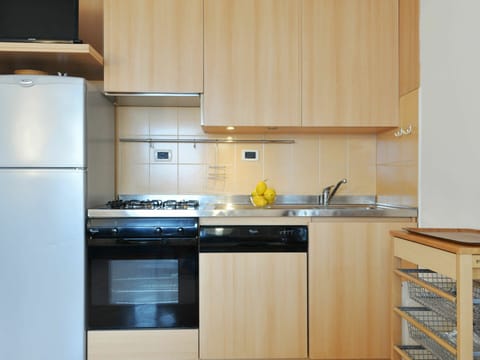 Cabinetry, Kitchen Sink, Countertop, Property, Sink, Kitchen, Kitchen Stove, Tap, Building, Wood