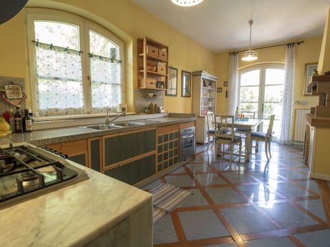 Property, Countertop, Room, Building, Floor, Furniture, Kitchen, Yellow, Interior Design, House