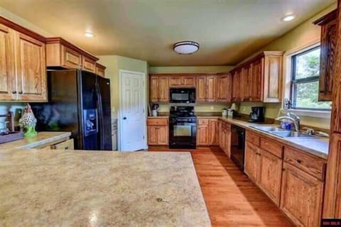 The kitchen has all the items you would need to make and enjoy a great meal.