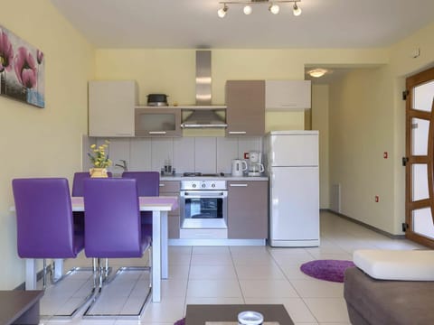 Cabinetry, Furniture, Building, Purple, Shelf, Architecture, Flooring, Interior Design, Floor, Countertop