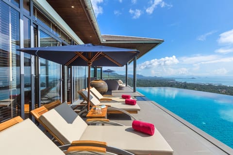 Outdoor pool, an infinity pool, sun loungers