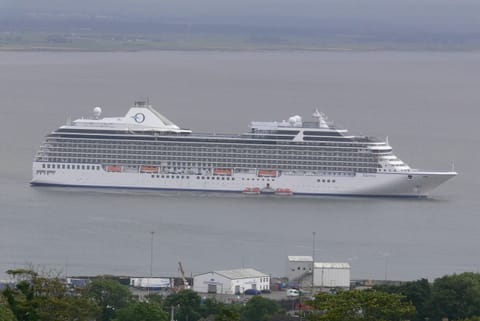 CRUISE SHIP ANCHORED OFF THE HARBOUR