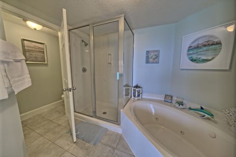 Combined shower/tub, hair dryer, towels, soap