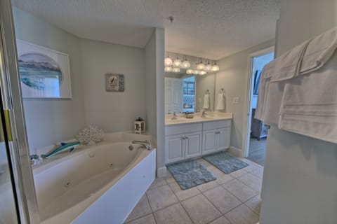 Combined shower/tub, hair dryer, towels, soap