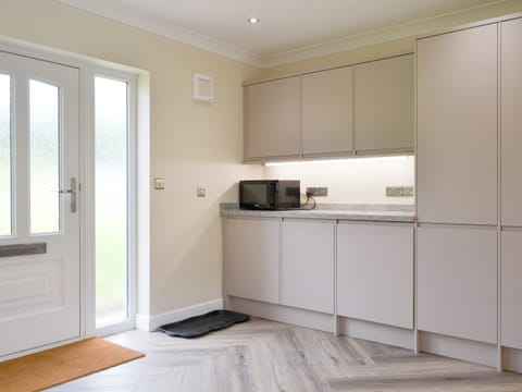 Well-equipped kitchen | Lucy’s at the Grange - Grange Country House Holiday Cottages, Loweswater, near Cockermouth