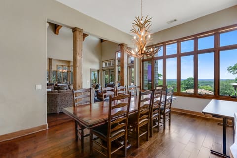 The dining room is very bright with natural light and also has amazing views.