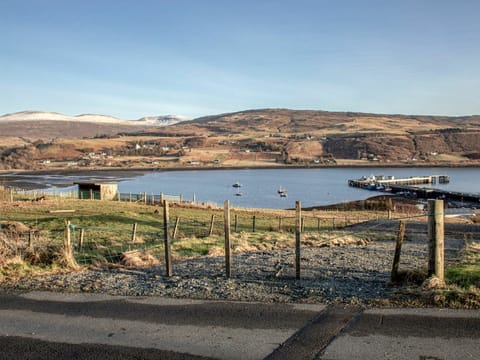 Water, Sky, Plant, Water Resources, Mountain, Boat, Land Lot, Fence, Natural Landscape, Lake