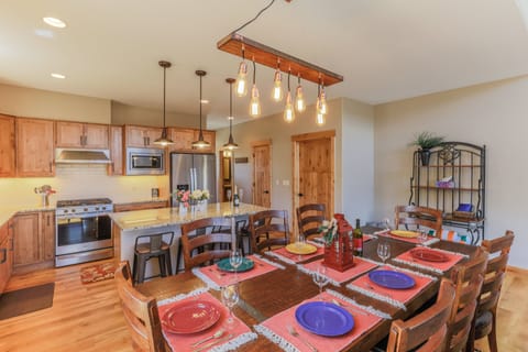 Dining area table seat 8 at the table and an additional 3 at the island