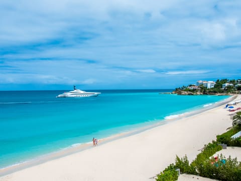 On the beach, sun loungers, beach towels