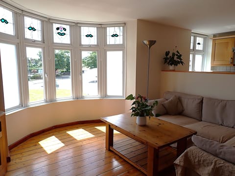 Front living room with views onto Griffin Park, Coney beach 300 yards from door