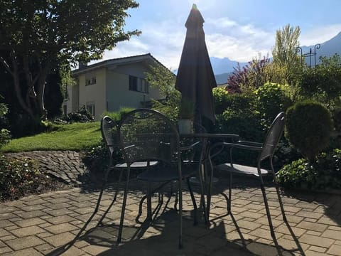 Relax from spring time to autumn in our neat garden place.