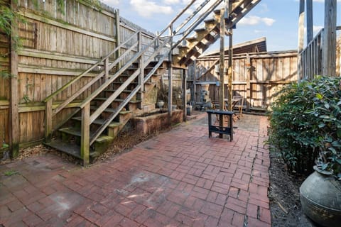 The home has a private courtyard shared with the lower unit.