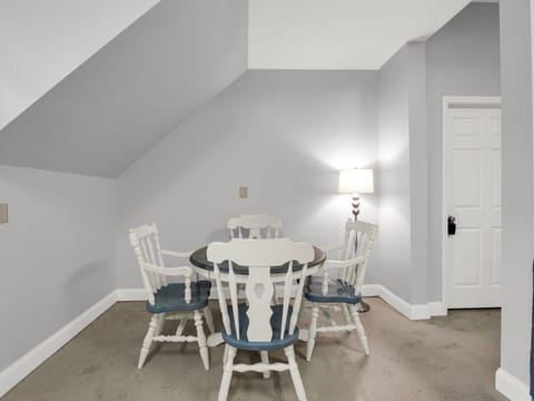 Bright and simple, this cozy spot is perfect for conversation, puzzles, or a peaceful moment to yourself.