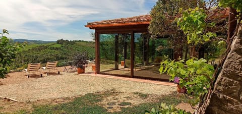 Private winter garden, and outdoor terrace, furnished for relaxation and lunch, with wonderful view