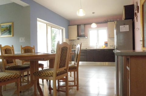 living area - kitchen - dining