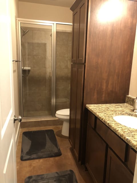 Combined shower/tub, hair dryer, towels, soap