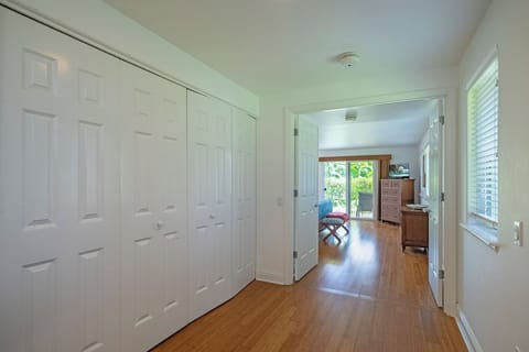 The downstairs hallway has a full size washer and dryer behind the closet doors, and the grand master suite has double doors that can be closed for additional privacy and soundproofing.