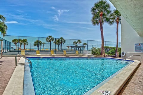 A heated pool, sun loungers