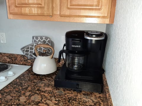 Fridge, microwave, stovetop, coffee/tea maker