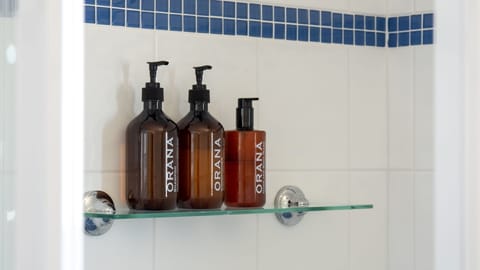 Combined shower/tub, jetted tub, eco-friendly toiletries, hair dryer