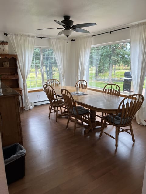 The large dining room table is perfect for family meals and car