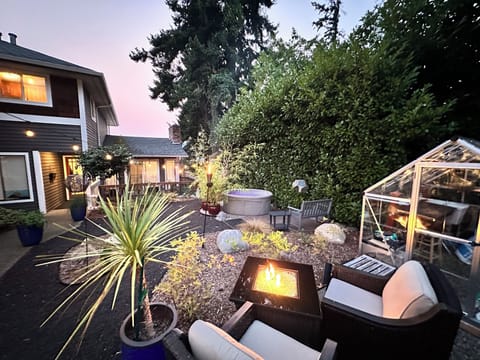 Right outside your front door are both the spa patio and the garden patio