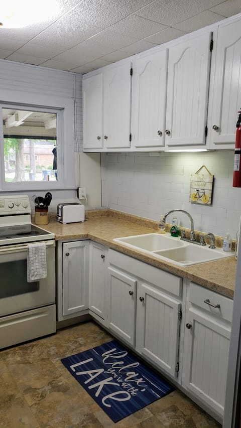 Includes cutlery, glassware, tableware, pots, pans, cooking spray, salt&pepper.