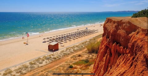 On the beach, sun loungers