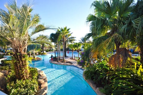 A heated pool, sun loungers