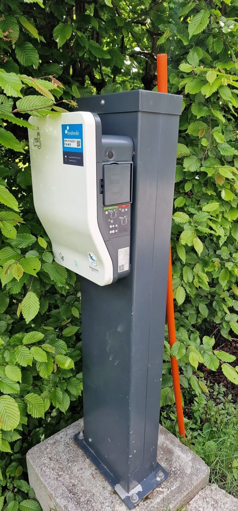 electric car charger available with dedicated parking space