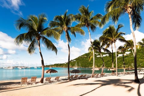 On the beach, sun loungers, beach towels