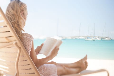 On the beach, sun loungers, beach towels