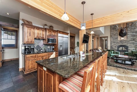 Spacious chef's kitchen with modern stainless steel appliances