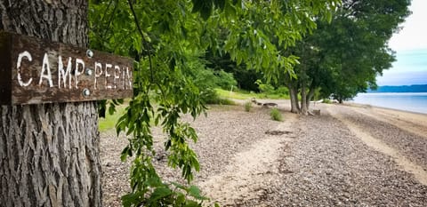 A summer camp cabin with attached bath and lounge area Cabin in Lake Pepin