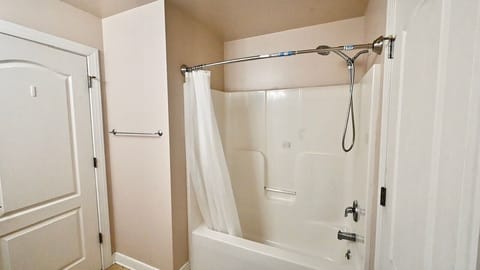 Combined shower/tub, hair dryer, shampoo, toilet paper