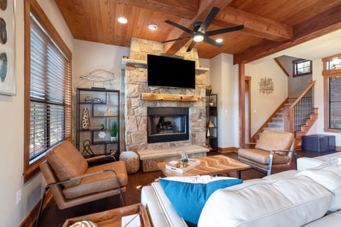 Flat screen smart TVs in the living and all bedrooms