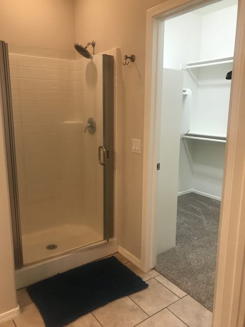 Combined shower/tub, hair dryer, towels, toilet paper