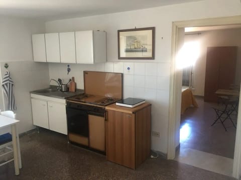 Fridge, electric kettle, toaster, cookware/dishes/utensils