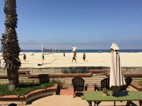 On the beach, sun loungers, beach towels