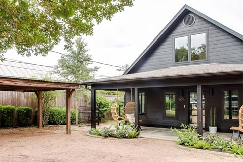 The Njem Haus front entrance provides off-street, covered parking.