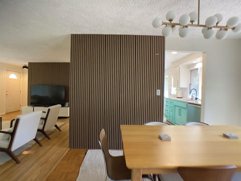 Enjoy meals in around the dining room table with seating for 6-8.