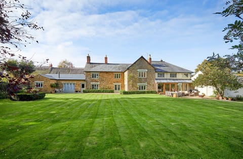 Rear of the main house showing barn on the left.