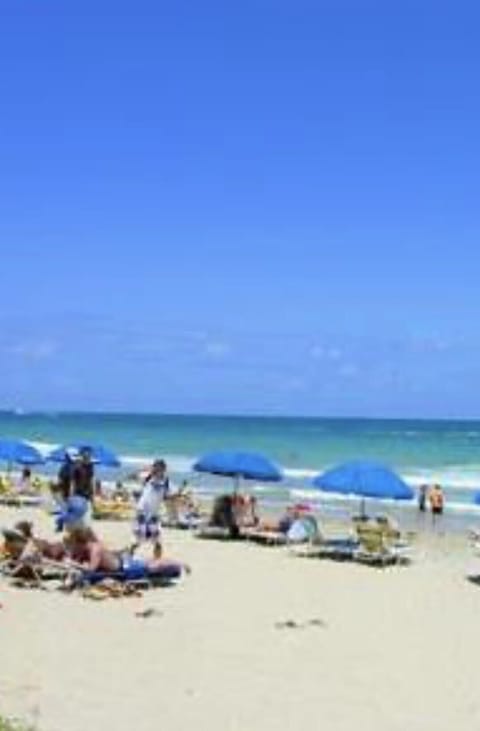 On the beach, sun loungers, beach towels