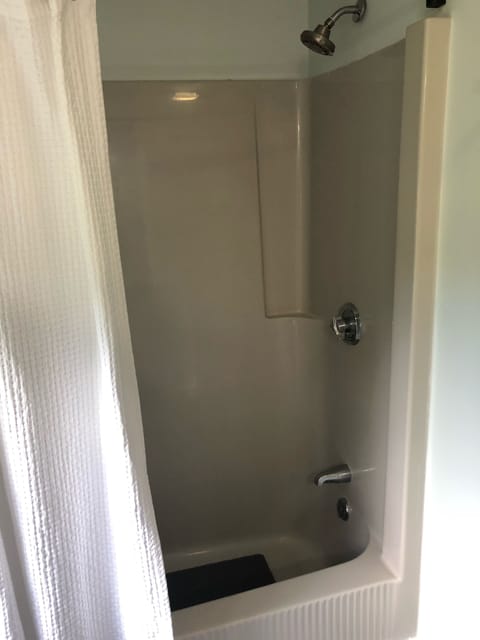 Combined shower/tub, toilet paper